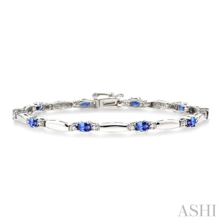 1/10 ctw Bar and Oval Mount Round Cut Diamond & 5x3MM Oval Cut Tanzanite Precious Bracelet in 10K White Gold