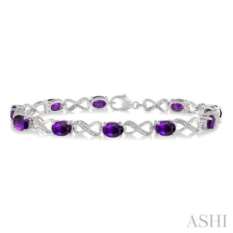 1/10 ctw Round Cut Diamond & 7x5MM Oval Cut Amethyst Semi Precious Infinity Bracelet in Sterling Silver